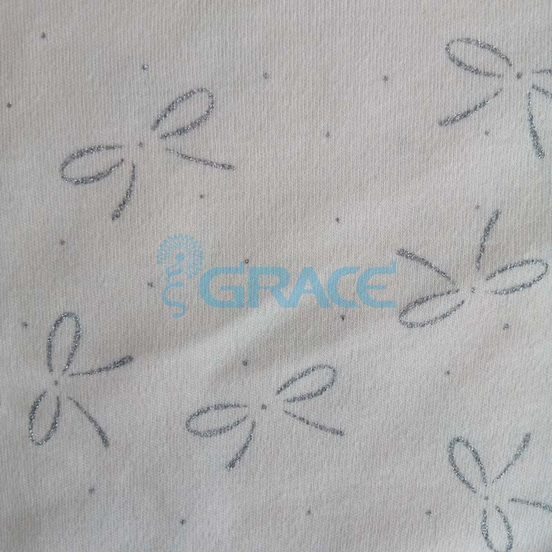 Интерлок с глиттером (блеском) банты на бежевом - ткань хлопковая трикотажная с рисунком 