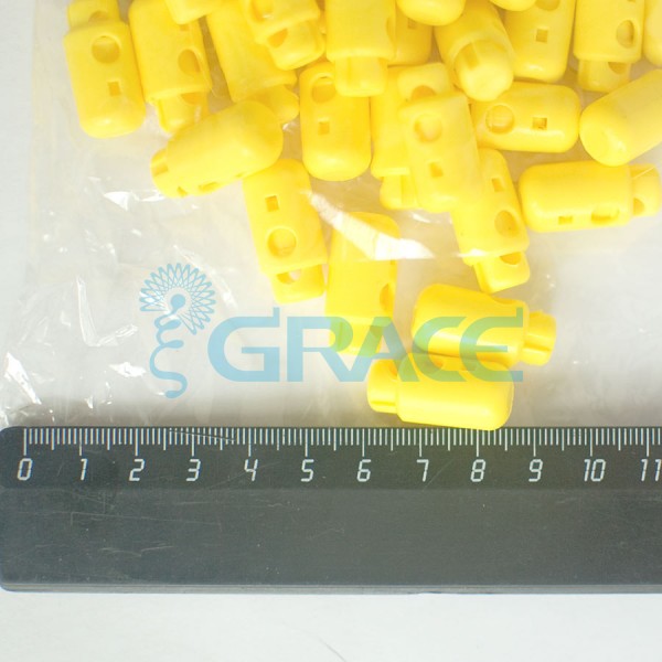 Фиксатор пластиковый для шнура Sto-13.50 (желтый)