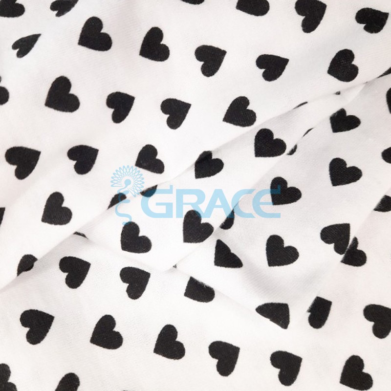 Кулирка джерси - ткань хлопковая трикотажная, белая с орнаментом черные сердца