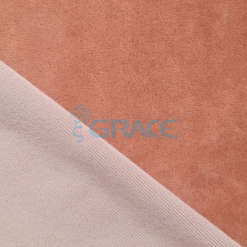 Ткань велюр - натуральная трикотажная, эластичная в розово-оранжевом цвете