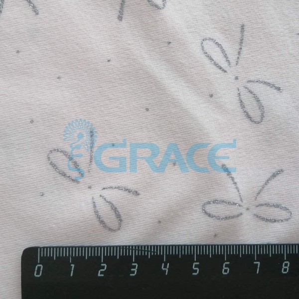 Интерлок с глиттером (блеском) банты на бежевом - ткань хлопковая трикотажная с рисунком 