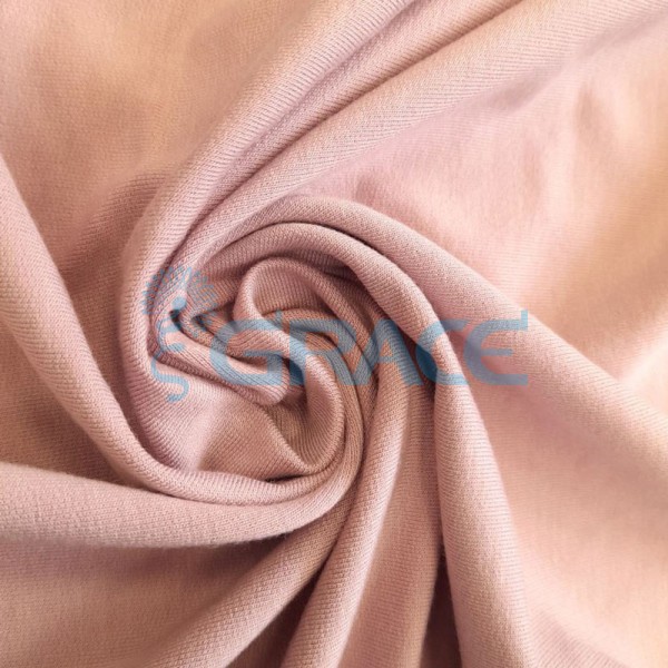 Вискоза - ткань натуральная трикотажная, эластичная в розовом цвете