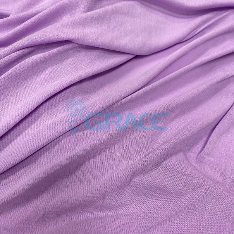 Вискоза - ткань натуральная трикотажная, эластичная в фиолетовом цвете