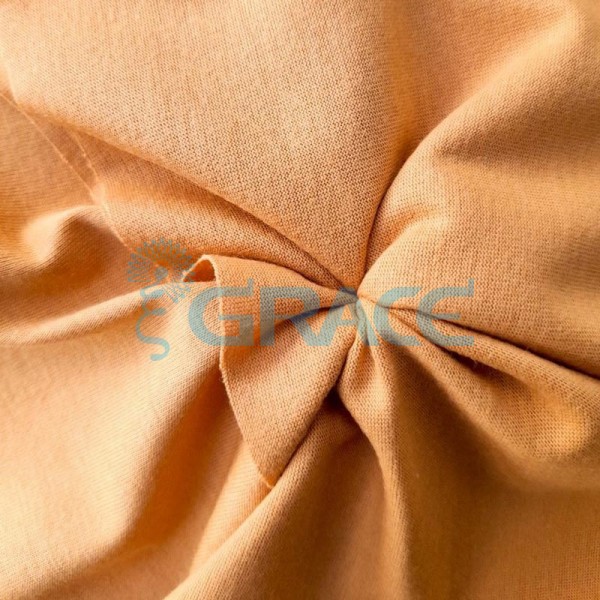 Интерлок оранжевого, медового оттенка - ткань хлопковая трикотажная однотонная
